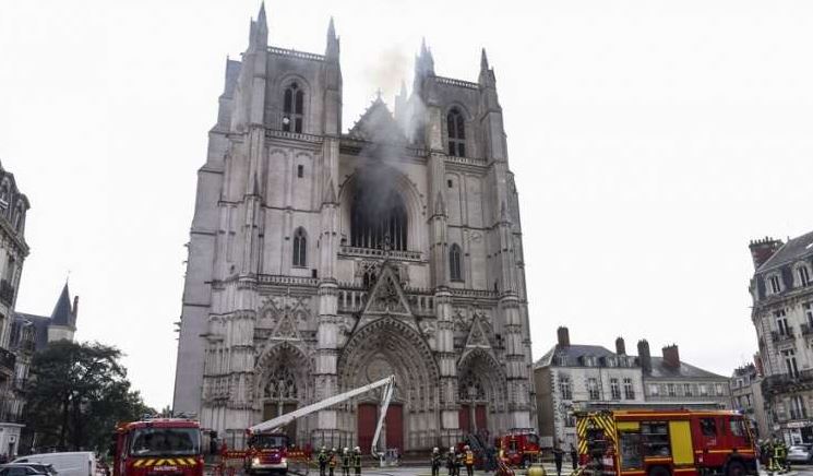 French cathedral burns in suspected arson fire